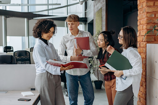 Two managers look at operational stats and implement Lean Six Sigma principles to optimize operations